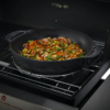 Cast iron wok and steamer set suited towards weber BBQs to stir fry and steam food.