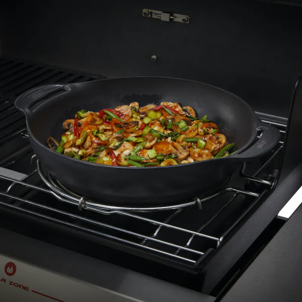 Cast iron wok and steamer set suited towards weber BBQs to stir fry and steam food.