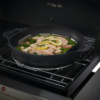 Cast iron wok and steamer set suited towards weber BBQs to stir fry and steam food.