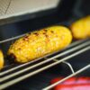 Corn on the cob cooking on a Summit Gas BBQ